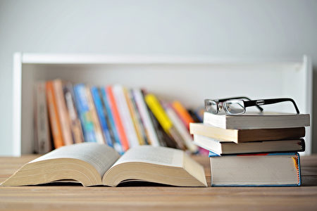 Pile of books on table