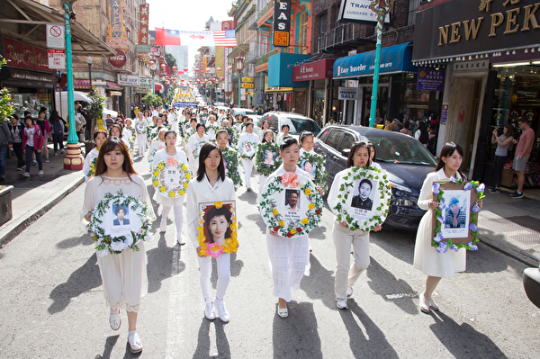  10月22日，來自世界各地的部分法輪功學員及民眾四千人在舊金山市中心舉行大型遊行，呼籲制止中共迫害法輪功、制止中共強摘人體器官、法辦迫害元凶江澤民。（季媛／大紀元）